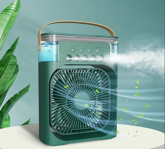 A portable green misting fan with a top handle, shown with water level and mist output illustrated on a light blue background with decorative leaves.