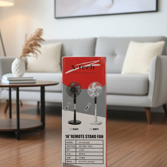A 18-inch remote control stand fan in its original retail packaging, showing black and white options with product specifications printed on the box.